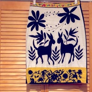 Embroidered double llama pencil skirt.